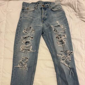 High Rise Boyfriend Jeans With Heavy Distressing